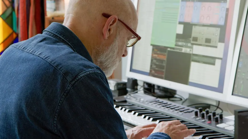 Brian Eno in the studio, photo by Gary Hustwit