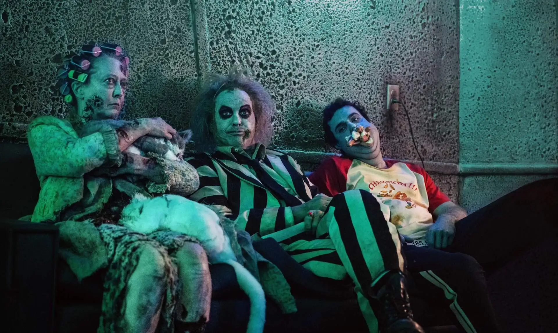 Michael Keaton (center) in Tim Burton's "Beetlejuice Beetlejuice." (Courtesy Warner Bros. Pictures)