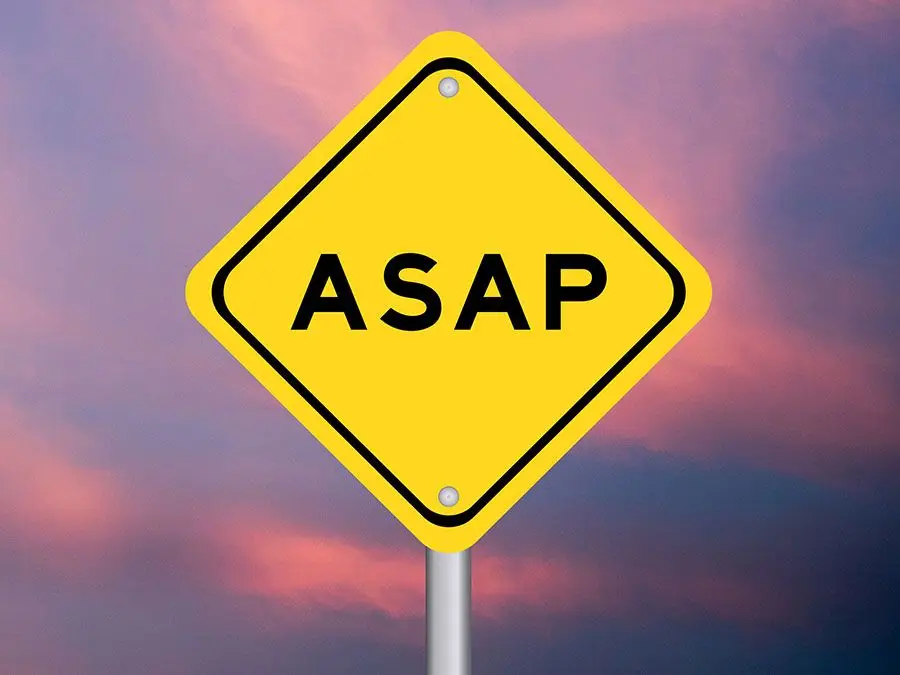 Yellow transportation sign with ASAP (as soon as possible) on violet color sky background. (acronyms)