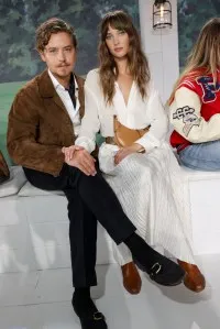 Cole Sprouse and Ari Fournier at Ralph Lauren RTW Spring 2025 as part of New York Ready to Wear Fashion Week on September 5, 2024 in East Hampton, New York.  (Photo by Lexie Moreland/WWD via Getty Images)