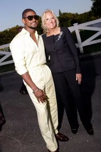 Usher and Dr. Jill Biden at Ralph Lauren RTW Spring 2025 as part of New York Ready to Wear Fashion Week on September 5, 2024 in East Hampton, New York.  (Photo by Lexie Moreland/WWD via Getty Images)