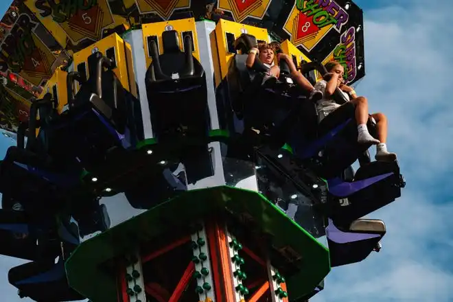 Kids ride the super shot at the Tuscarawas County Fair.