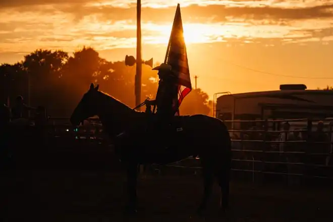 The cowboy's prayer is recited before the rodeo at the Tuscarawas County Fair.