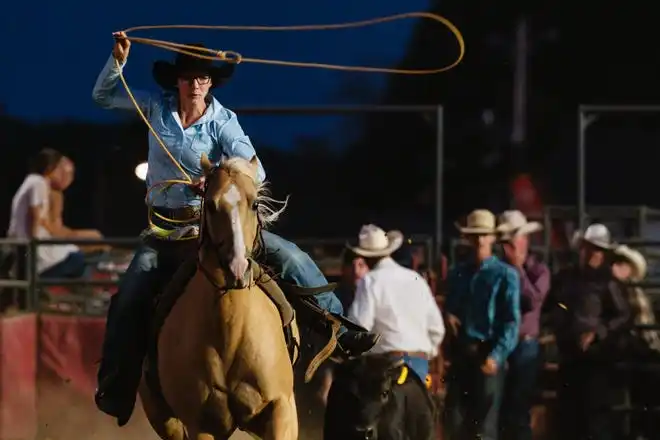 Kristine Treharne, from Negley, competes in break away roping during the rodeo at the Tuscarawas County Fair.