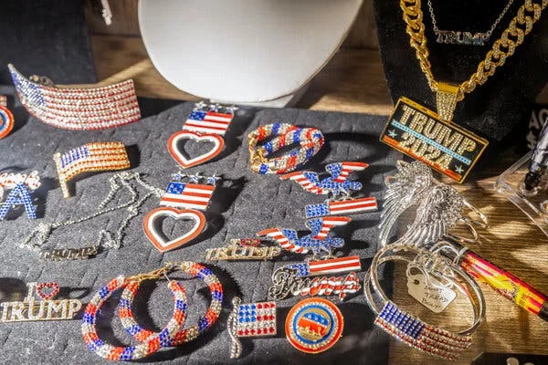 A selection of sparkly flag pins and other political jewelry.