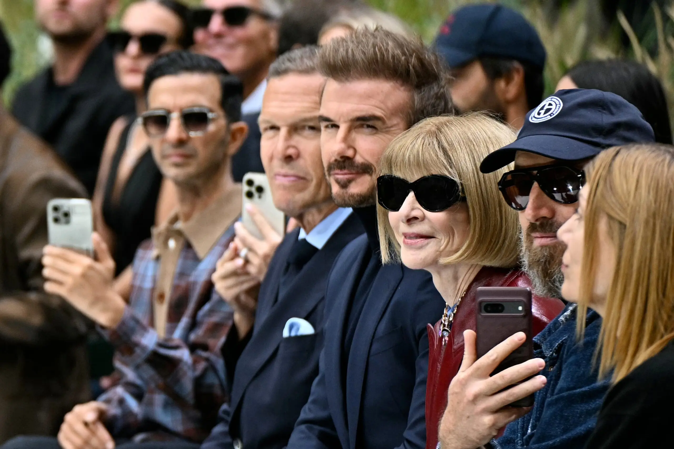 David Beckham was sitting between Daniel Grieder, Boss’s chief executive, and Anna Wintour, the editor-in-chief of Vogue