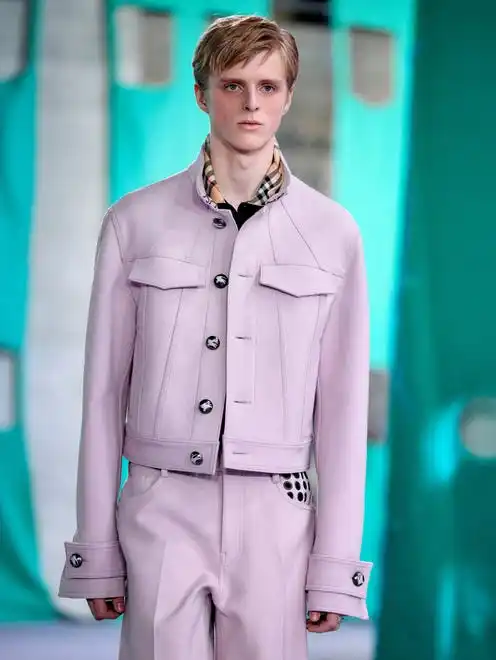 A model walks the runway for Burberry during LFW.