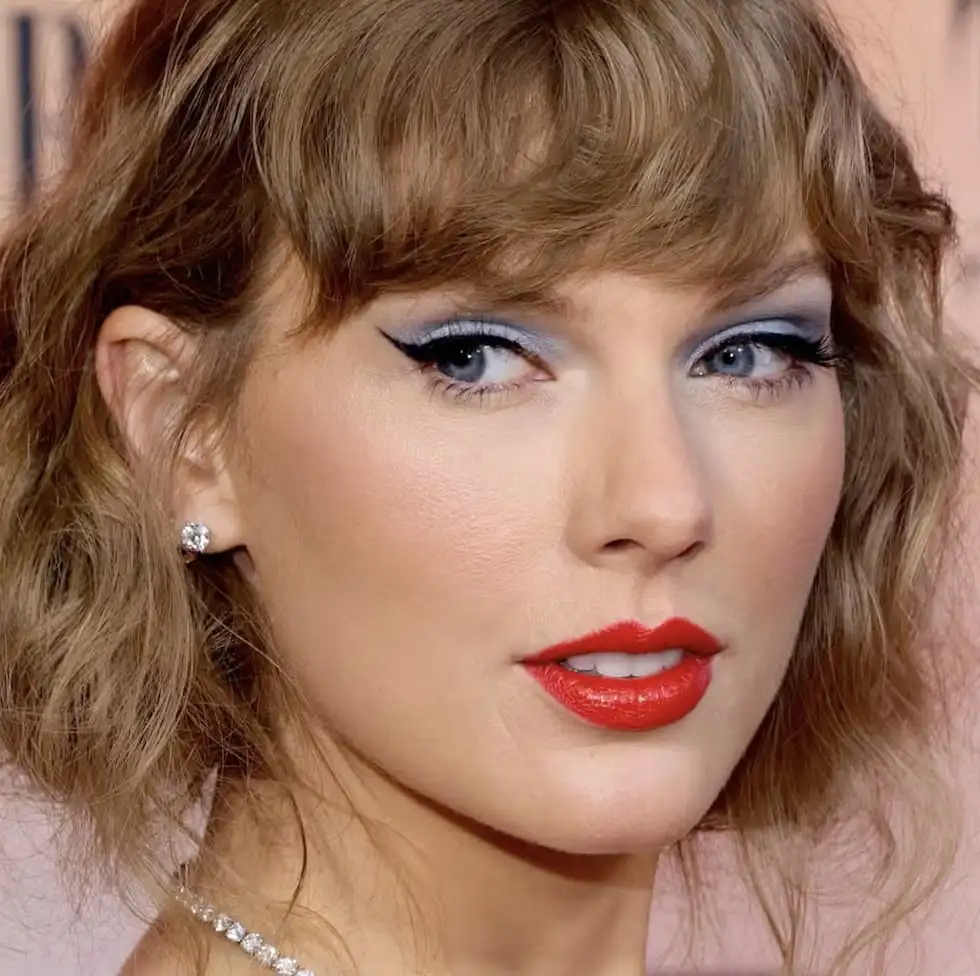 Taylor swift is considered to have a neutral undertone, which makes cooler red lips brighten...