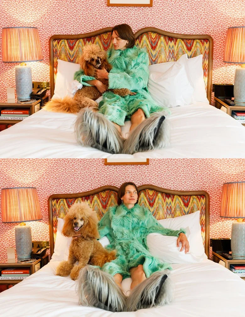 Woman in bed with dog