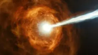 a bright white and blue burst jets from the center of swirling orange gas in space.