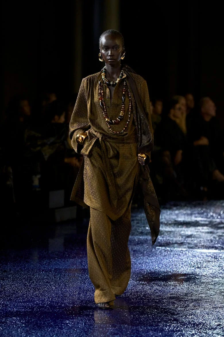 a look from saint laurent spring 2025 collection shown at paris fashion week runway show