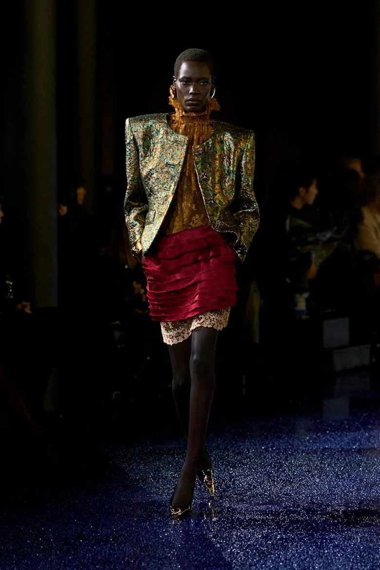 a look from saint laurent spring 2025 collection shown at paris fashion week runway show