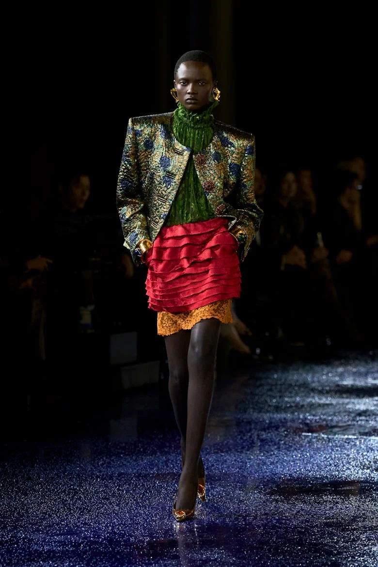 a look from saint laurent spring 2025 collection shown at paris fashion week runway show