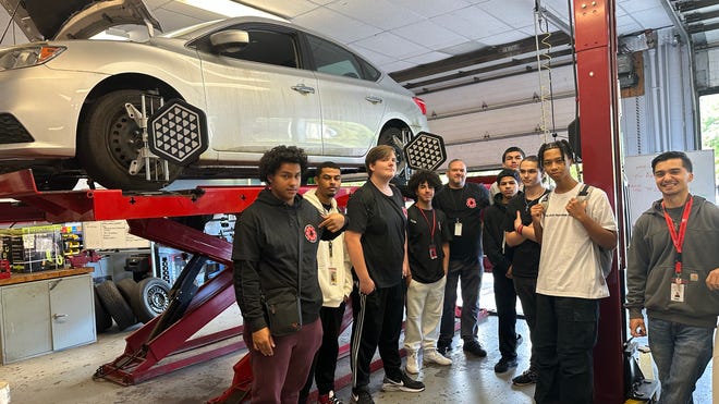 ‘Going to be awesome’: Brockton High auto-shop students can now train on electric cars