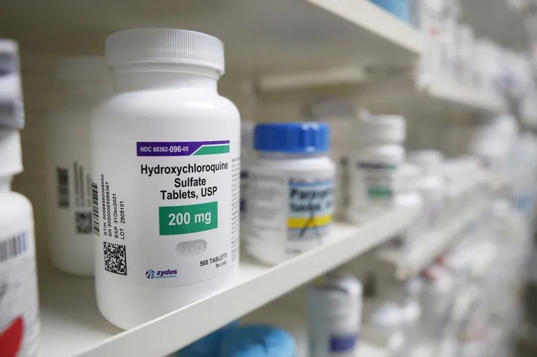 A labelled container of Hydroxychloroquine sits on a pharmacy shelf in Utah.