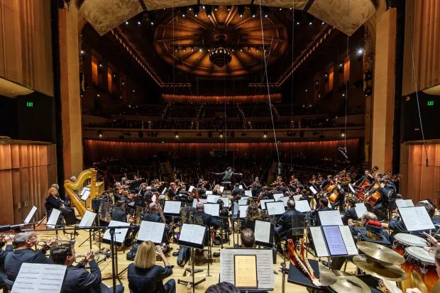 The San Diego Symphony photographed from the choral terrace at the back of the stage in the newly renovated Jacobs Music Center in downtown San Diego during its opening-night concert on Saturday, Sept. 28.(Todd Rosenberg)