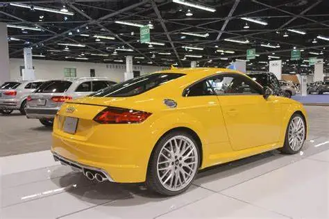 Yellow Audi on display at the Orange County Auto Show International