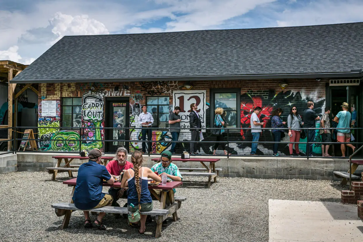 People enjoy the outside patio (George Rose / Getty Images file)