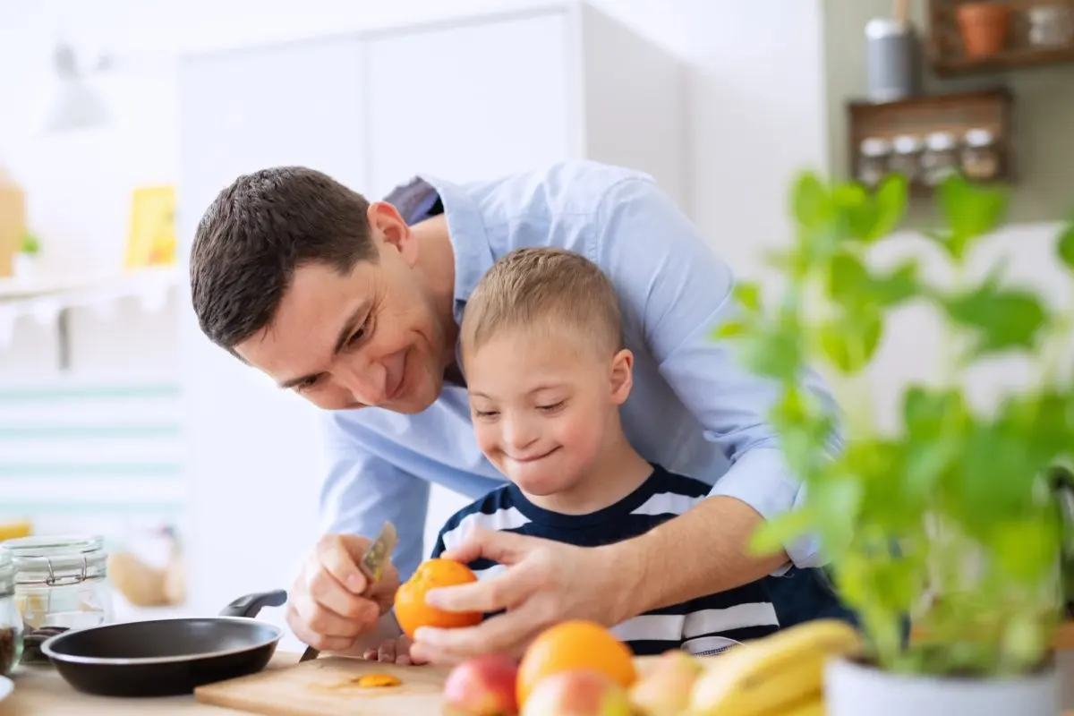 A father with happy Down's syndrome son