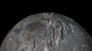 A close-up of Plutos moon Charon