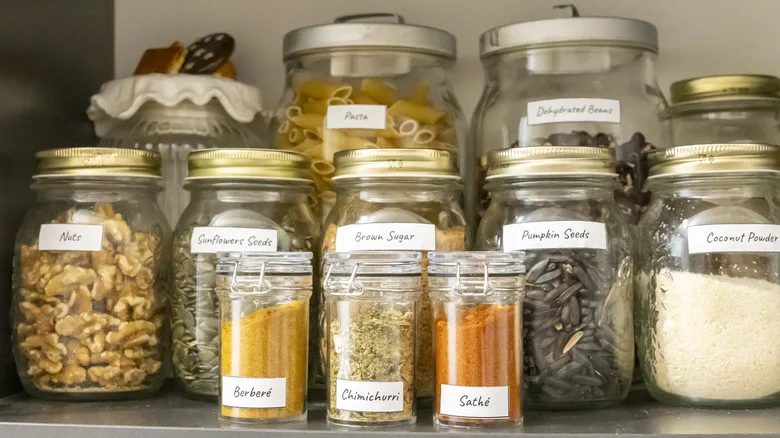 Labeled jars in pantry