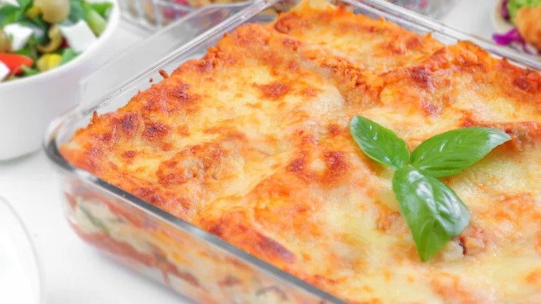 Lasagna dish with basil