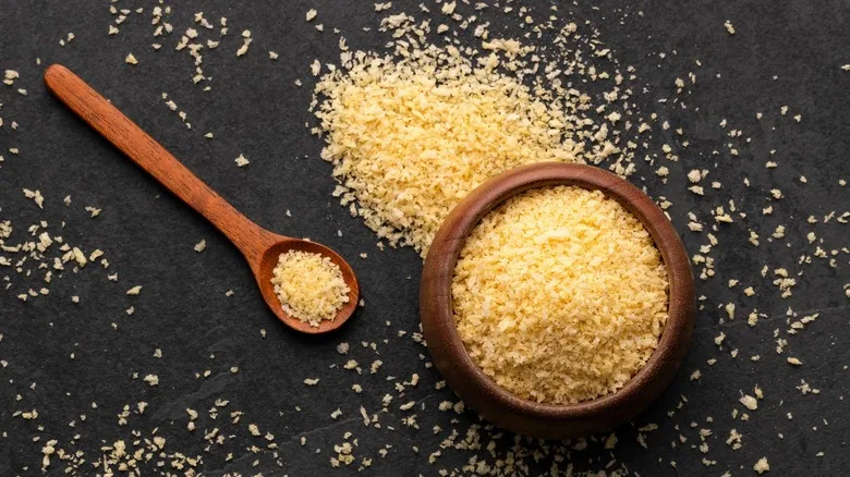 Bowl of breadcrumbs with spoon