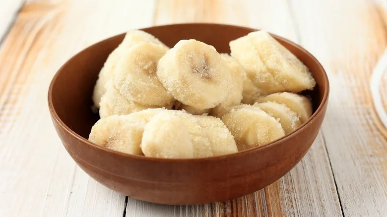 Frozen banana slices in bowl