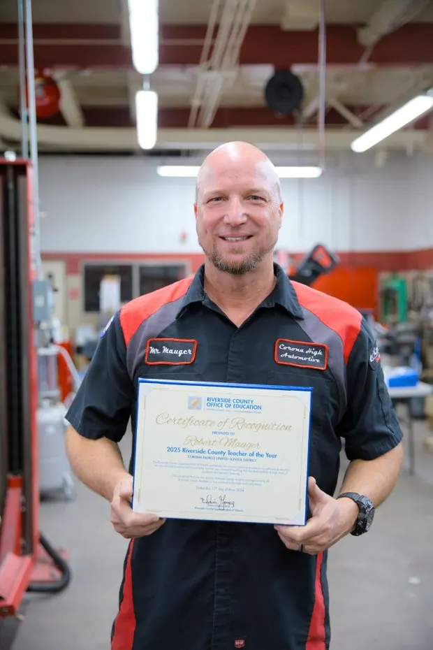 Robert Mauger, who teaches automotive technology at Corona High School, is seen Friday, May 17, 2024, when he was named a 2025 Riverside County Teacher of the Year. On Tuesday, Oct. 8, 2024, he was named a California Teacher of the Year for 2025. (Courtesy of Riverside County Office of Education)