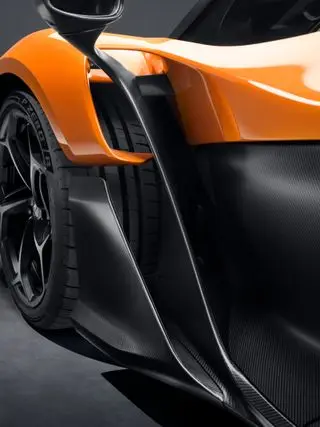 The W1's aerodynamics are carved deep into the bodywork