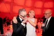 Actor Alan Cumming kisses the hand of host Cindy Rachofsky at the 2018 Two x Two for AIDS...