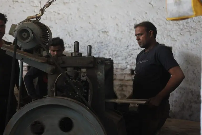 Sajid Ali, a third-generation artisan from Aligarh, produces around 35 to 40 locks of varying sizes every day, requiring approximately 15 kg of car scraps. Photo by Zoya Ada Hussain/Mongabay India.