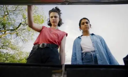 Roadtrippers … Margaret Qualley and Geraldine Viswanathan in Drive-Away Dolls.