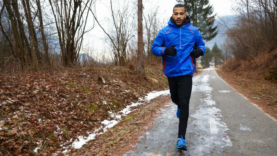 A man running in the cold outside