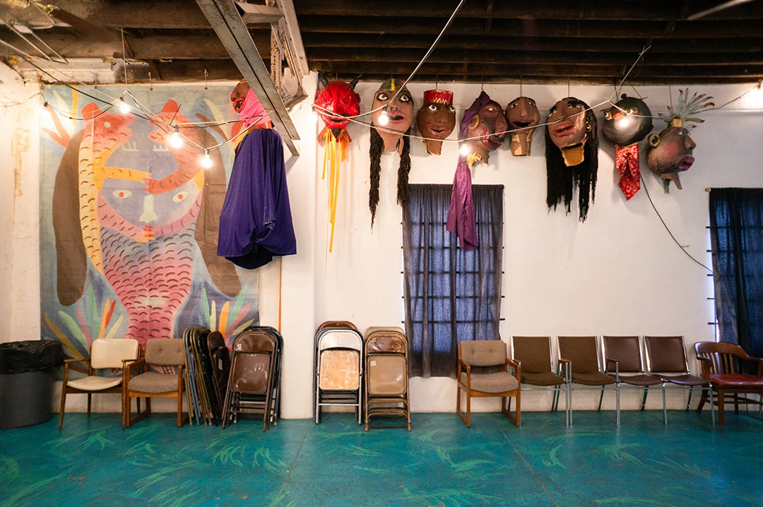 A photograph of theater props and chairs at the Esperanza Peace & Justice Center.