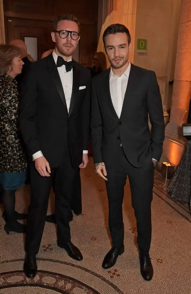 two men dressed in suits