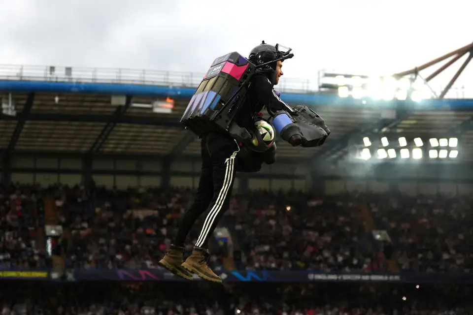 The official match ball is brought to the field by a person using a jetpack before Soccer Aid for UNICEF 2024 at Stamford Bridge, London. Picture date: Sunday June 9, 2024. (Photo by Bradley Collyer/PA Images via Getty Images)