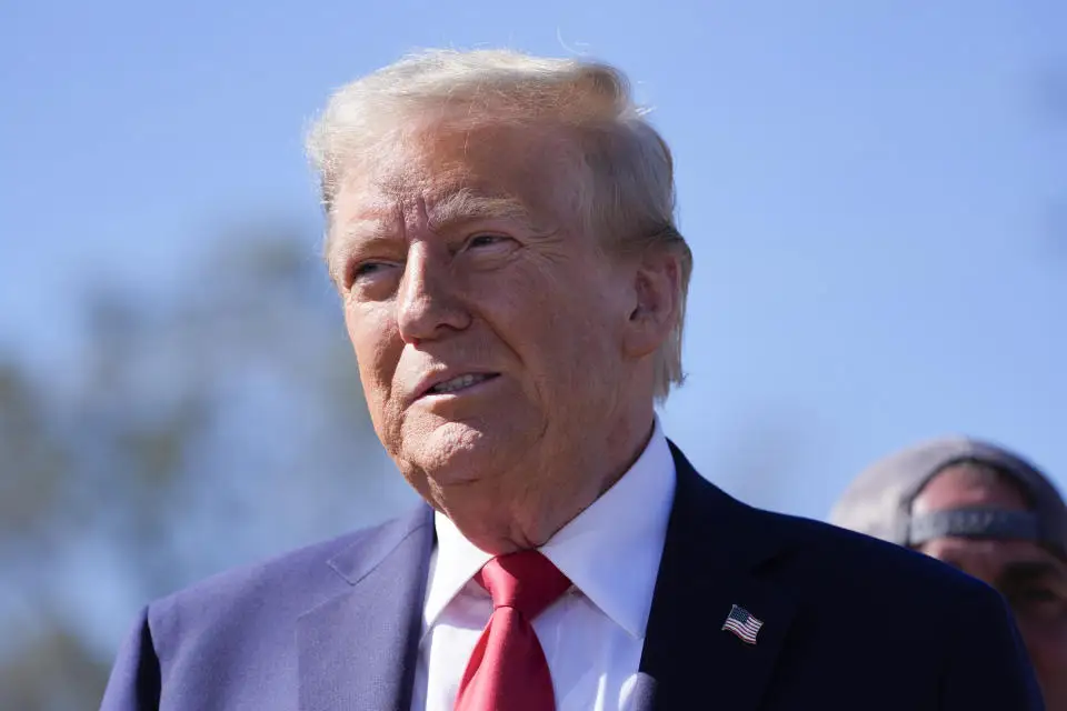 Republican presidential nominee former President Donald Trump listens to others after delivering remarks on the damage and federal response to Hurricane Helene, Monday, Oct. 21, 2024, in Swannanoa, N.C. (AP Photo/Evan Vucci)