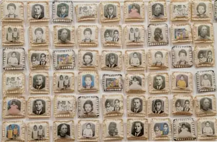 Dozens of black and white headshots stitched together in a grid.