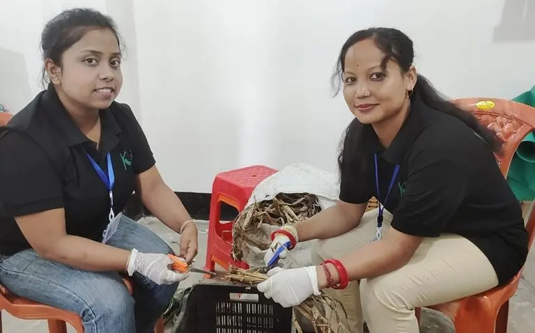 Moromi Hazowary (right) working in the factory. Image courtesy of the Kumbhi Kagaz