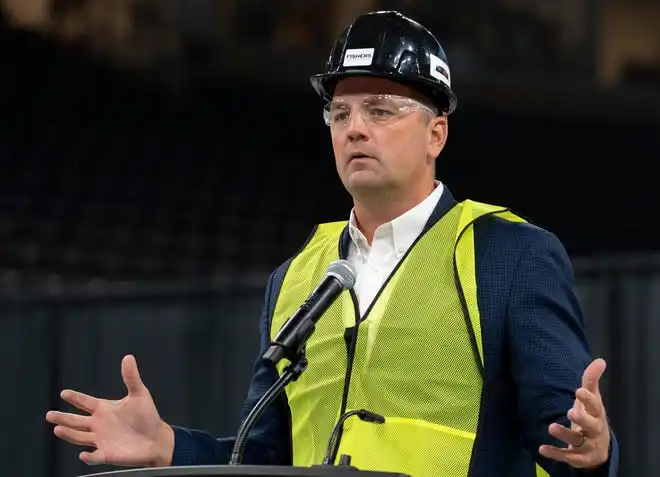 Mayor of Fishers Scott Fadness speaks during a press conference as construction continues Thursday, Oct. 24, 2024, at Fishers Event Center in Fishers, Ind. The new venue opens next month and will feature sporting and entertainment events.