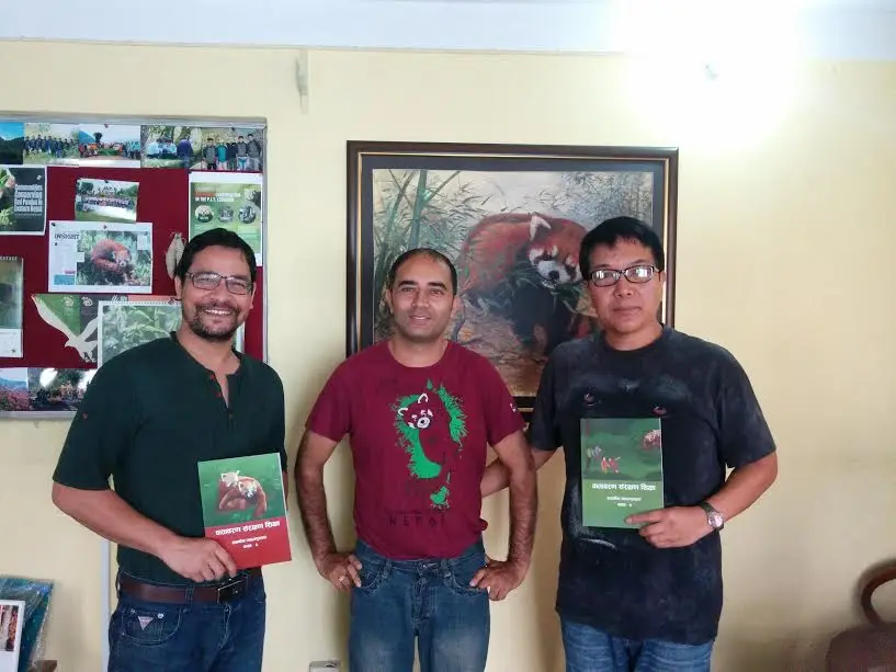 Anil Adhikari with members of the Red Panda Network