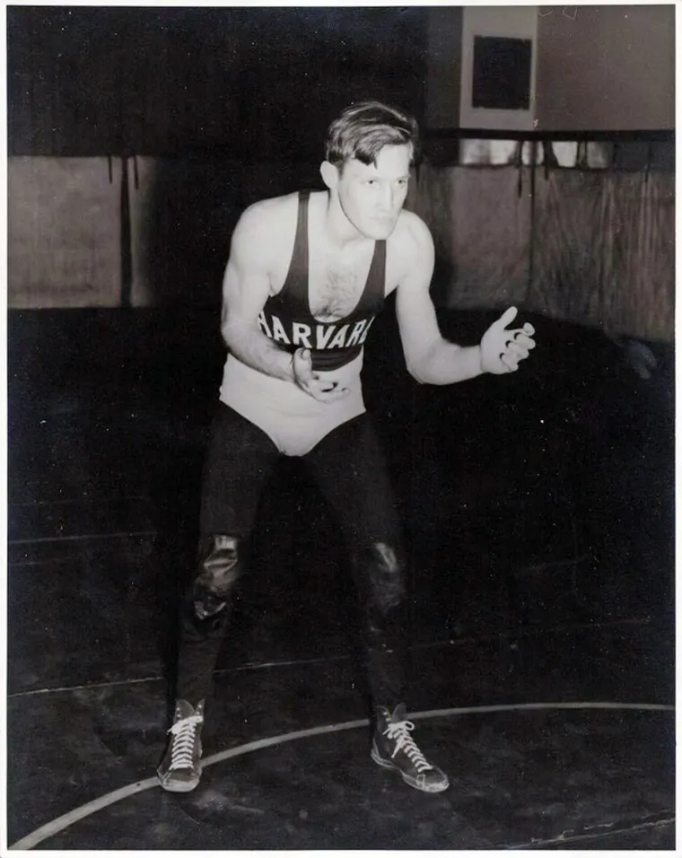 Old photo of David Scott in wrestling uniform.