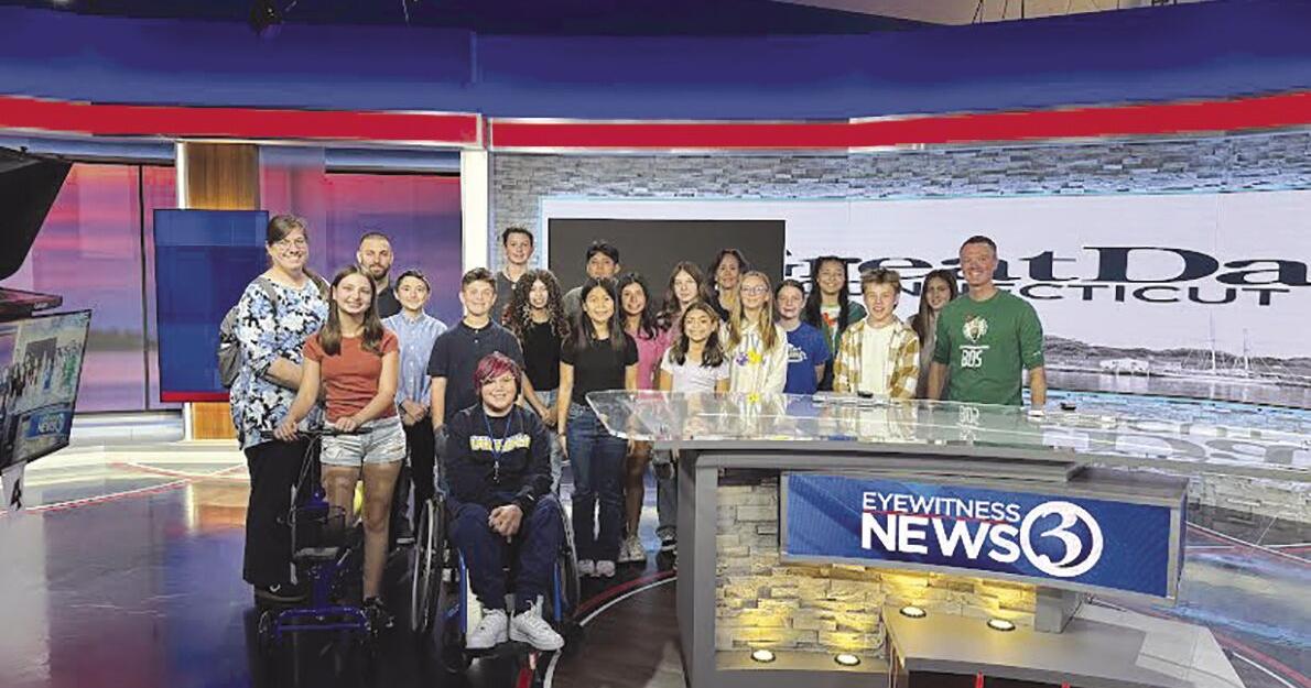 Plainville middle school students tour local television studio