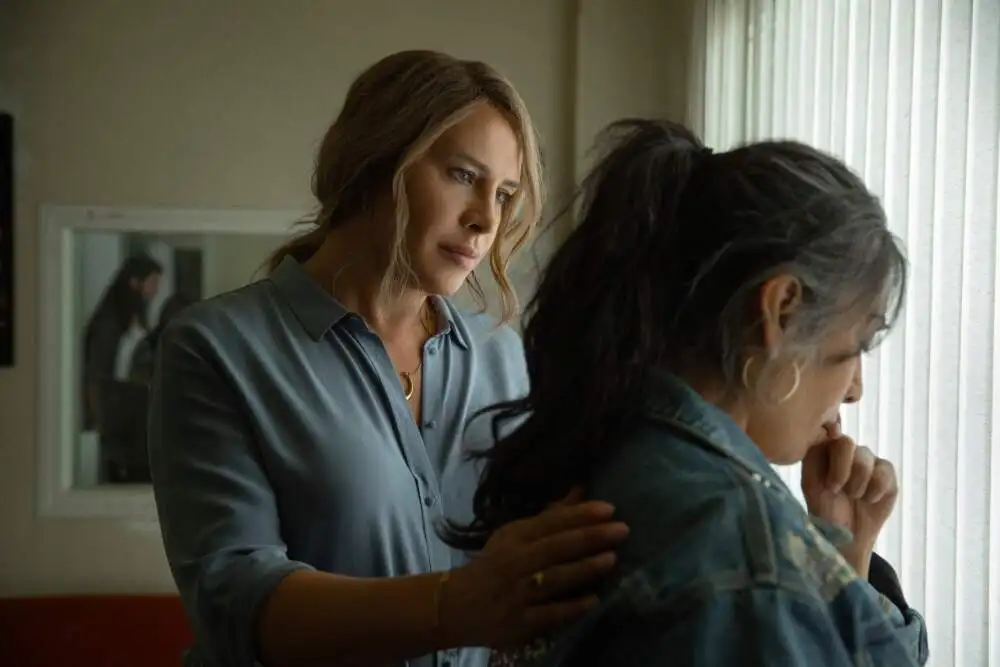 Karla Sofía Gascón (left) in "Emilia Pérez." (Courtesy Shanna Besson/Netflix)