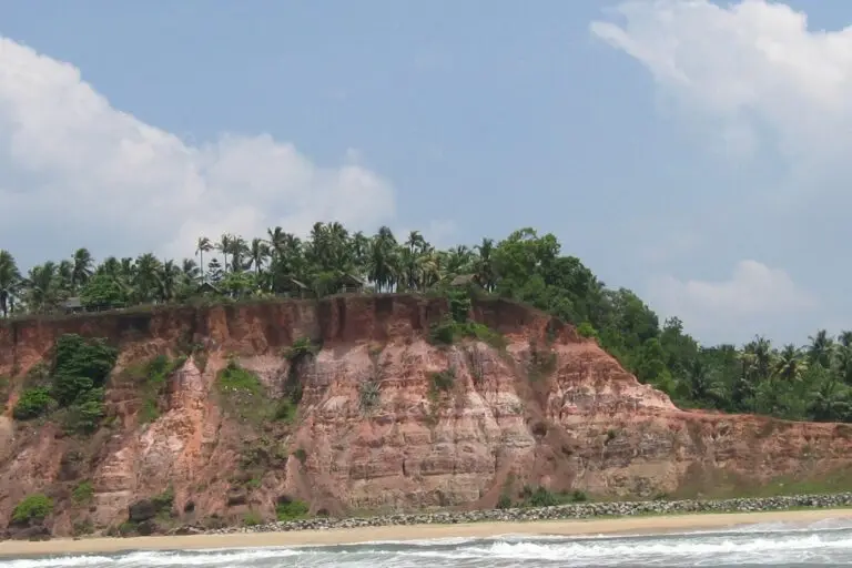 Varkala cliffs face rapid development, with restaurants, resorts, parking lots, and a helipad reshaping the landscape. Image: K S Sajinkumar