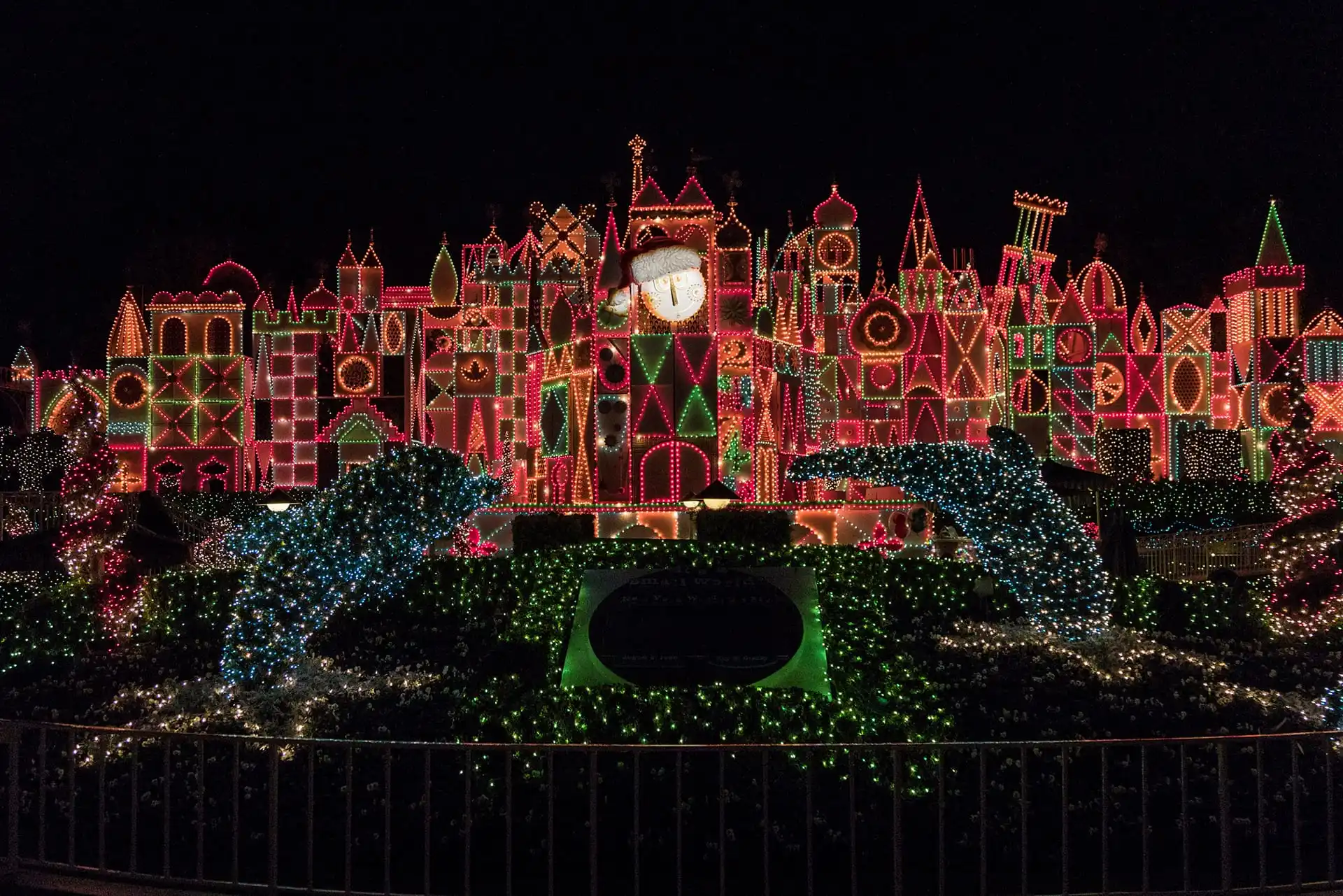 The building, reminiscent of Disneyland's enchanting allure, dazzles at night with vibrant, colorful lights arranged in mesmerizing patterns—perfect for holiday entertainment.