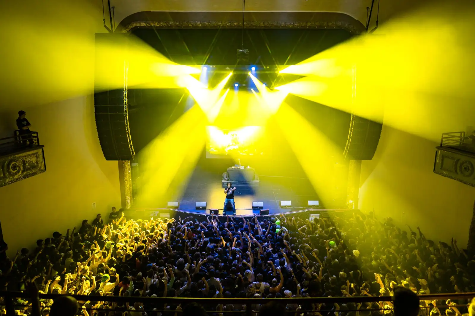 Image may contain Concert Crowd Person Lighting Urban Rock Concert Electronics and Speaker