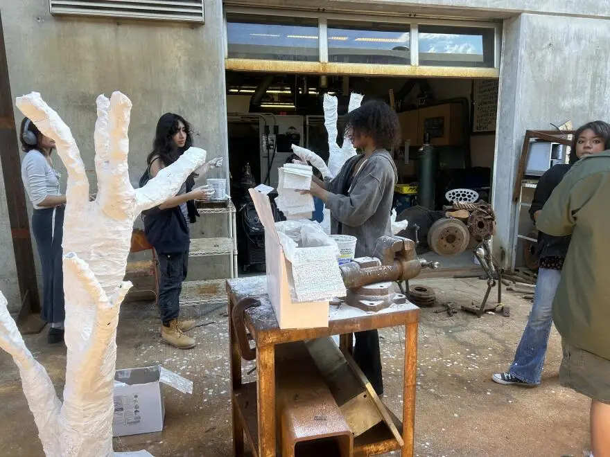 Students from Booker T. Washington High School creating their installation for the 2024 Aurora Biennial.