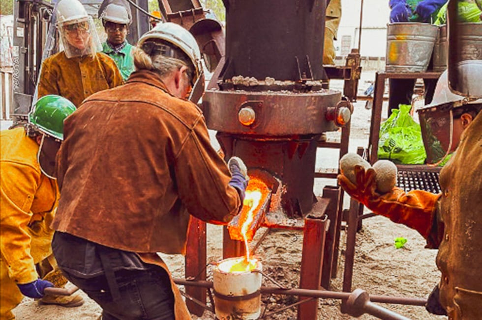 Molten metal ready for new art at Southern Miss Annual Iron Pour